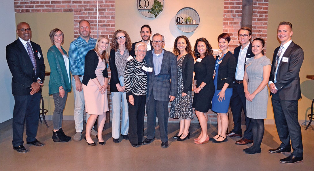 Lanny and Terry Passaro pose with School of Public Health recipients of their scholarship.