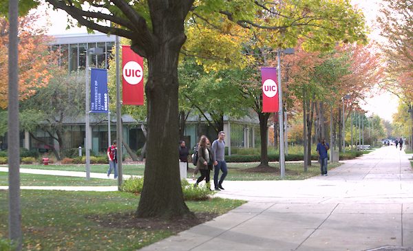 Students walk across the UIC campus near Douglas Hall.
