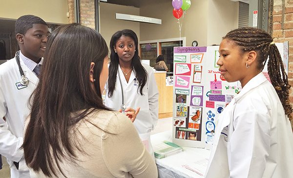 UIC medical students present at The Young Doctor's Club at North Lawndale High School.