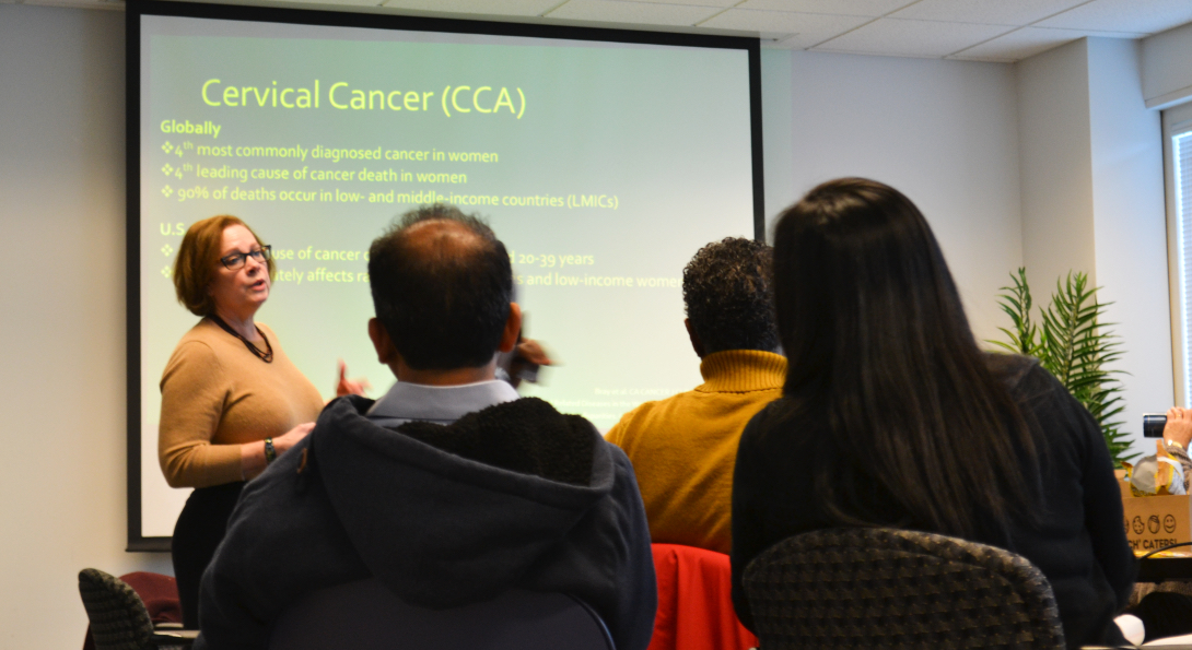 SPH professor Caryn Peterson speaks during a presentation on cervical cancer research at IHRP.