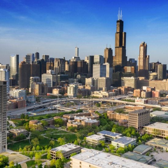 An aerial view of the Chicago skyline, with UIC's east campus in the foreground.