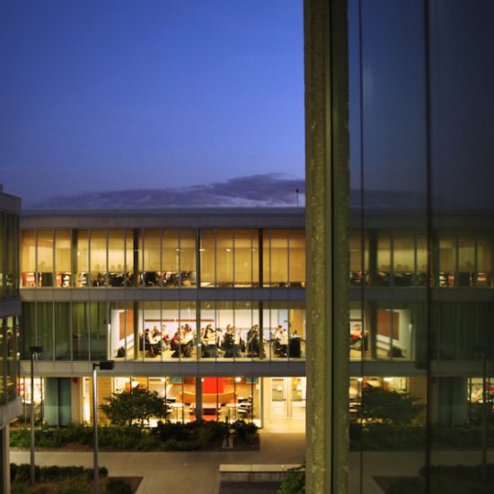 A view of UIC classrooms in Douglas Hall at night.