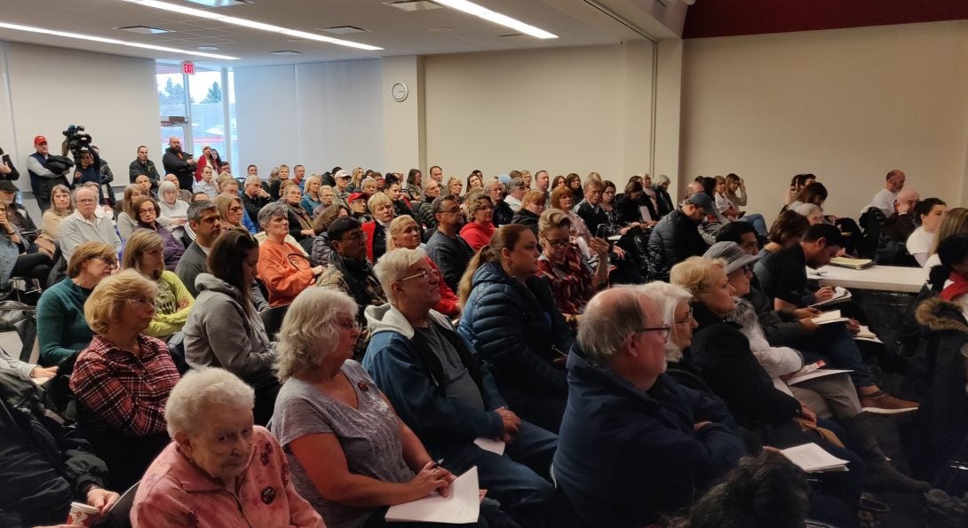 Lake County, Illinois residents listen to Dr. Susan Buchanan's presentation at the Warren Newport Public Library.