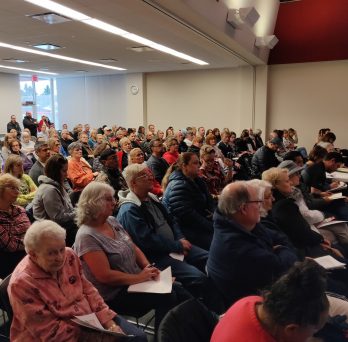 Lake County, Illinois residents listen to Dr. Susan Buchanan's presentation at the Warren Newport Public Library.
                  