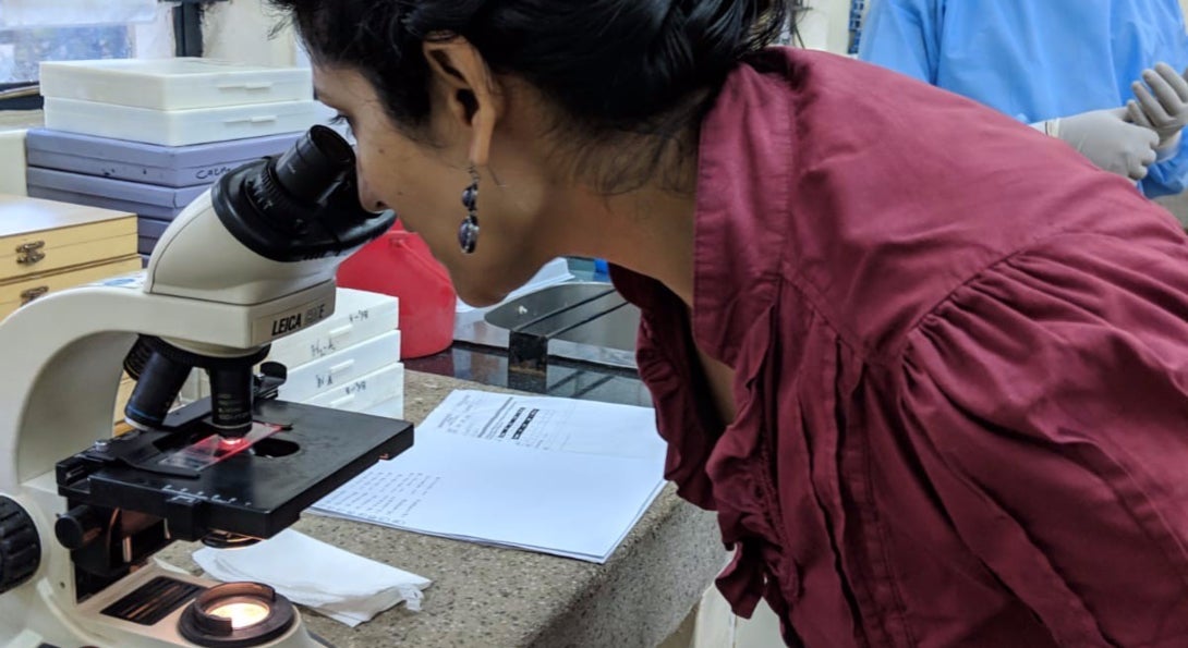 Supriya Mehta at work in a lab in Kisumu, Kenya.