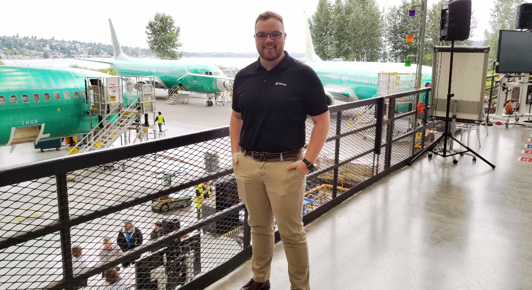Benjamin Tate poses for a photo at Boeing's Everett, Washington plant.