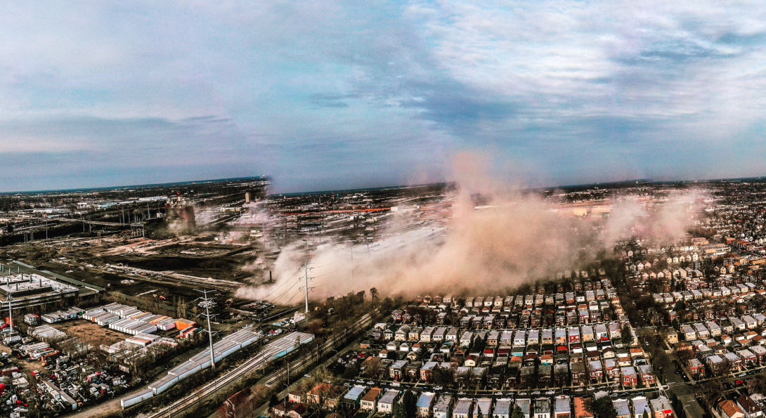 An aerial view of the demolition of a smokestack at the Crawford Generating Station, which generated a plume of dust that diffused through Chicago's Little Village neighborhood.