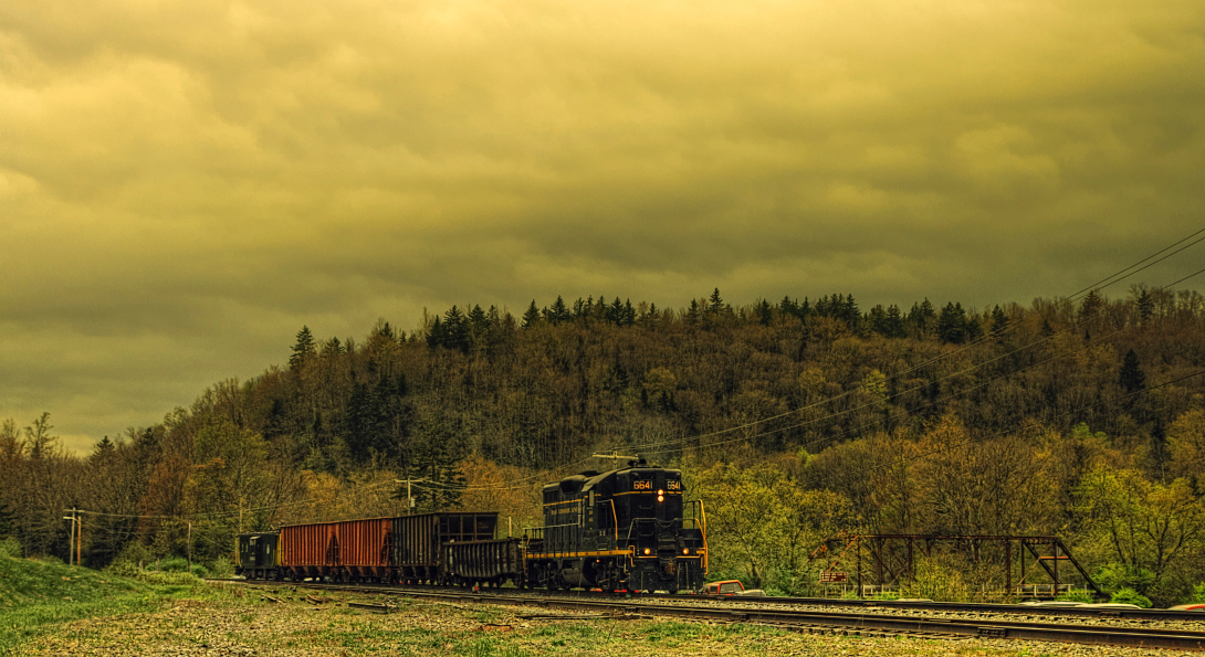 A coal train passes through a mining area in the Appalachian Mountains in West Virginia.