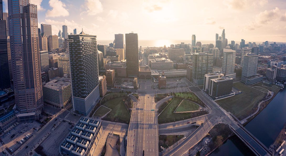 An aerial view of Chicago's South Loop neighborhood on the first day of the COVID-19 shelter in place order, with roadways virtually empty.