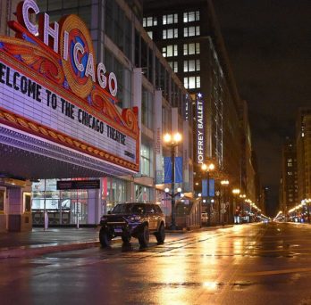State Street in Chicago is dark and devoid of traffic during the COVID-19 shelter-in-place.
                  