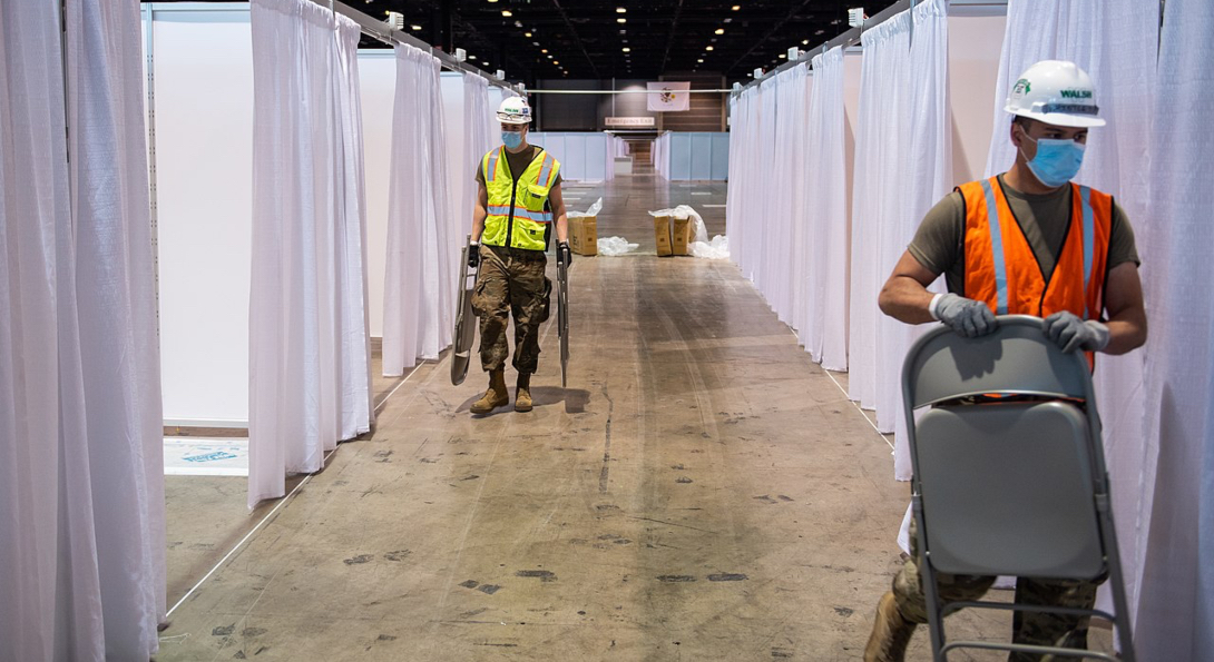 Illinois National Guard members set up mobile hospital booths at McCormick Place in Chicago. 
