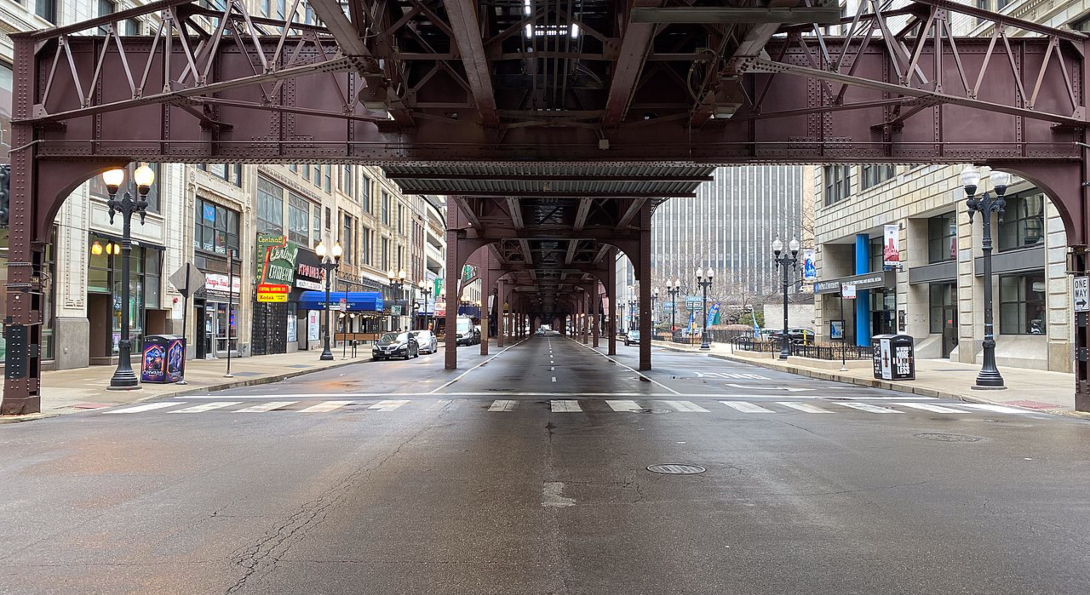 Wabash Avenue in Chicago, under the L tracks, is devoid of traffic during COVID-19 shelter-in-place orders.