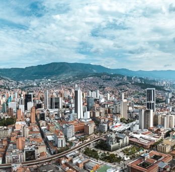 Wide-angle view of the city of Medellín, Colombia and the surrounding mountains.
                  