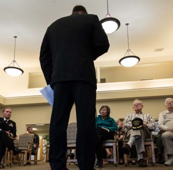 Chief Master-at-Arms Mark Durben, from Coshocton, Ohio, attached to Naval Magazine Indian Island, speaks at a Veterans Day ceremony at Seaport Landing Retirement and Assisted Living in Port Townsend, Wash.
                  