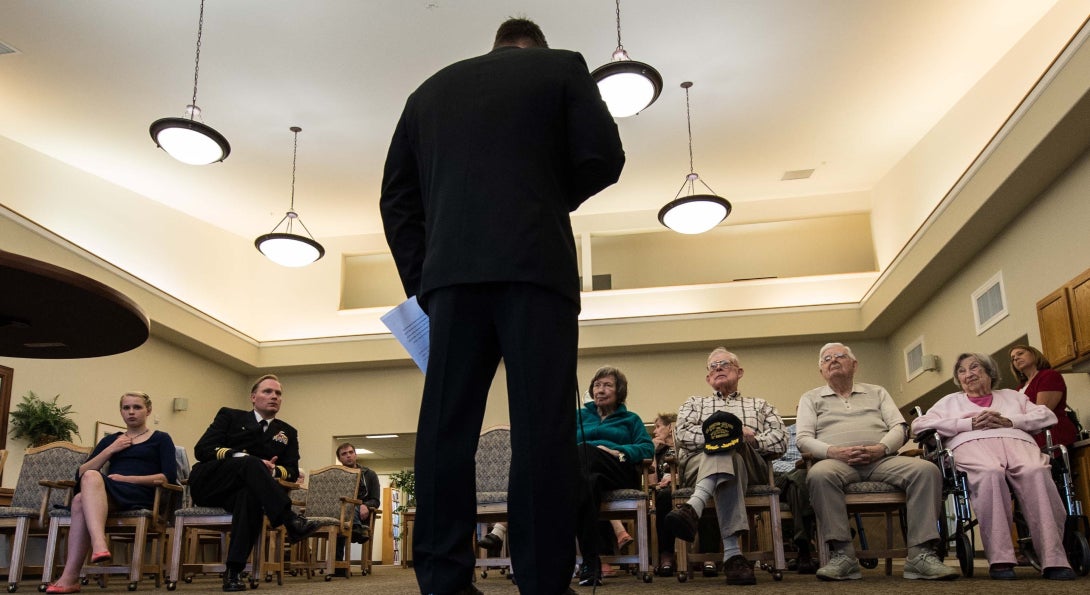 Chief Master-at-Arms Mark Durben, from Coshocton, Ohio, attached to Naval Magazine Indian Island, speaks at a Veterans Day ceremony at Seaport Landing Retirement and Assisted Living in Port Townsend, Wash.