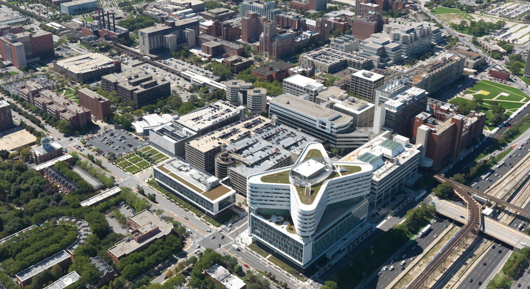 An aerial view of Rush University Medical Center, with UIC's  health sciences campus in the background.
