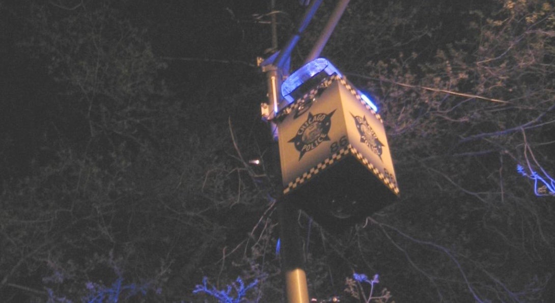 A Chicago police remote camera, mounted on a light pole at an intersection in the city.