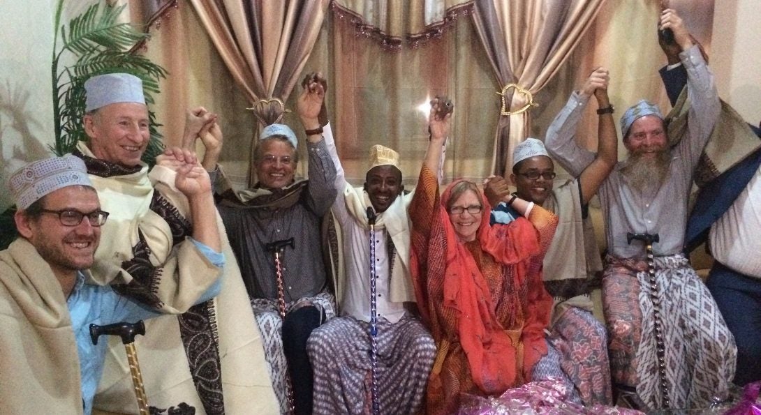 Mary Harvey poses for a picture with USAID colleagues and members of the Somali government.