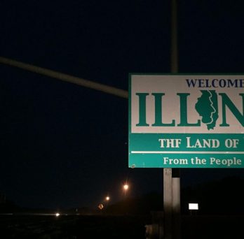 A billboard at the Illinois state border stating: Welcome to Illinois, the Land of Lincoln.
                  