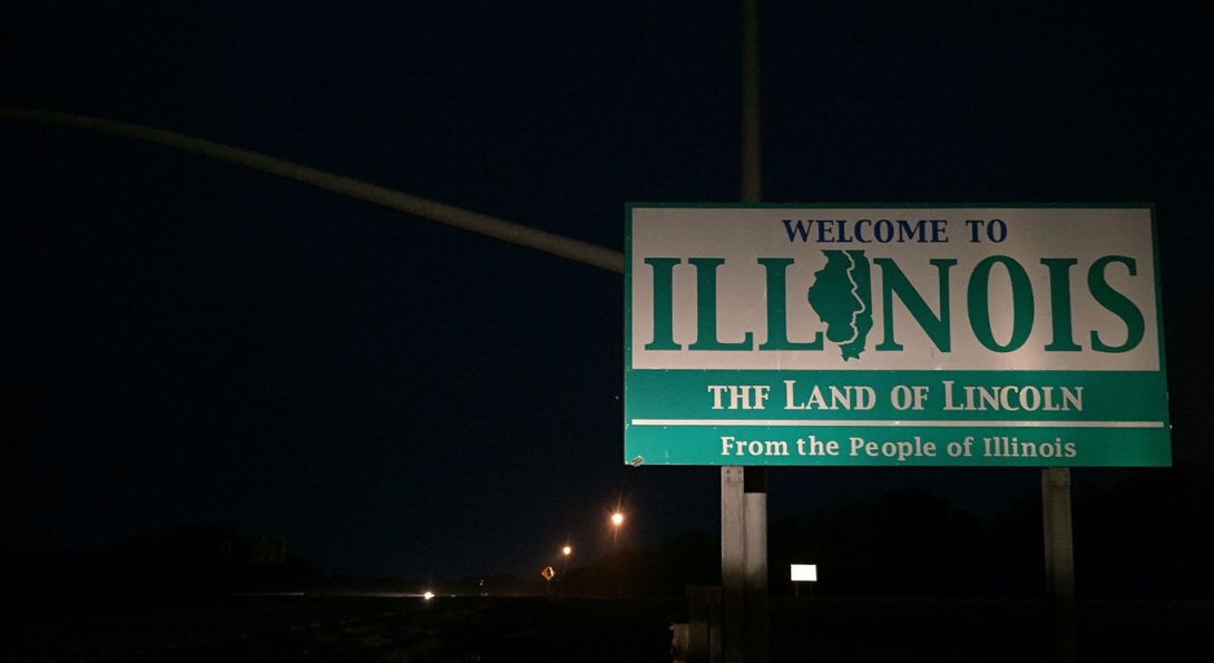 A billboard at the Illinois state border stating: Welcome to Illinois, the Land of Lincoln.