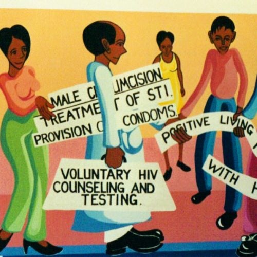 A mural shows strategies for preventing HIV transmission.