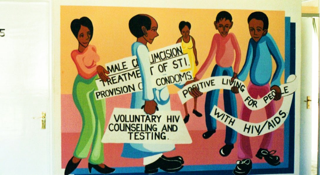 A mural promotes HIV prevention strategies including male medical circumcision.