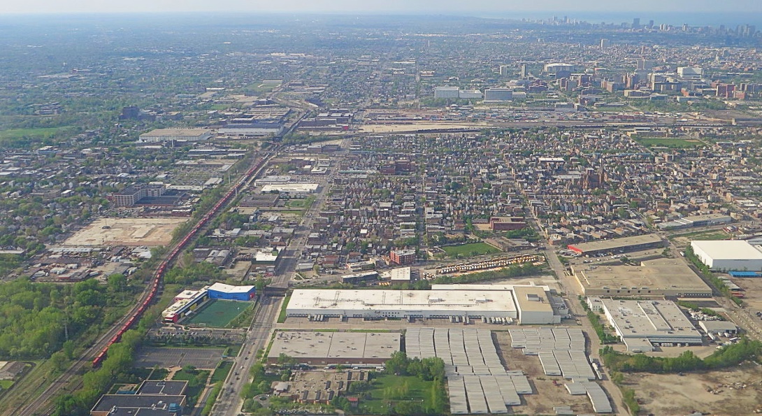 An aerial view of industries and railroads across the southwest side of Chicago