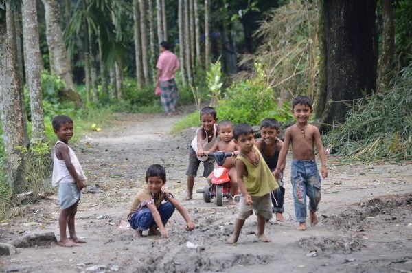 Children play in a rural street in Bangladesh.