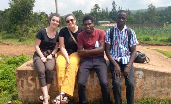 SPH students engaged in fieldwork in Kenya pose for a photo with Kenyan colleagues.