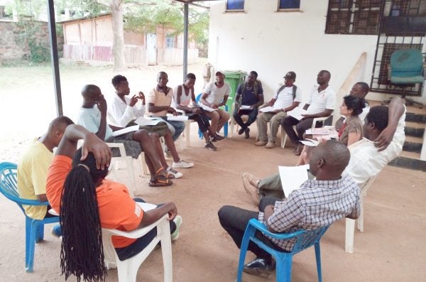 A support meeting taking place at the Anza Mapema Clinic in Kisumu.