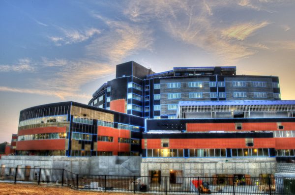 The exterior of a large hospital complex.