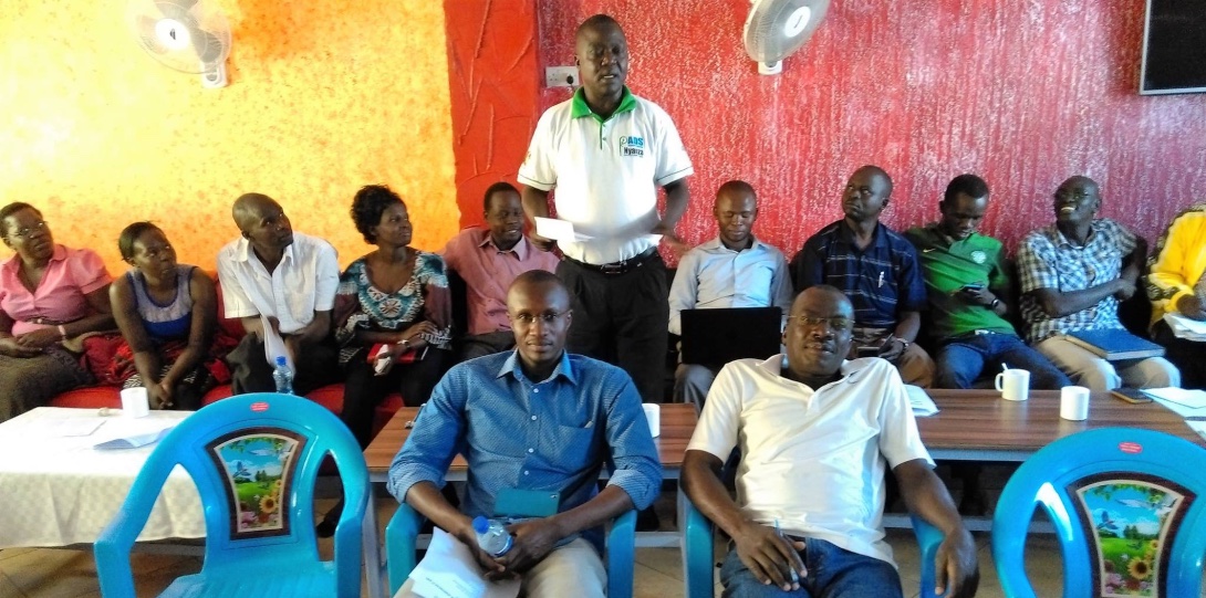 A group of people taking part in a meeting of the Nyanza Reproductive Health Society.