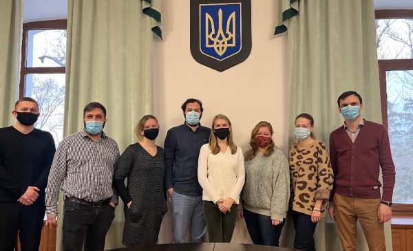 Tamara Kozyckyj poses for a photo with members of the Ukrainian Ministry of Health