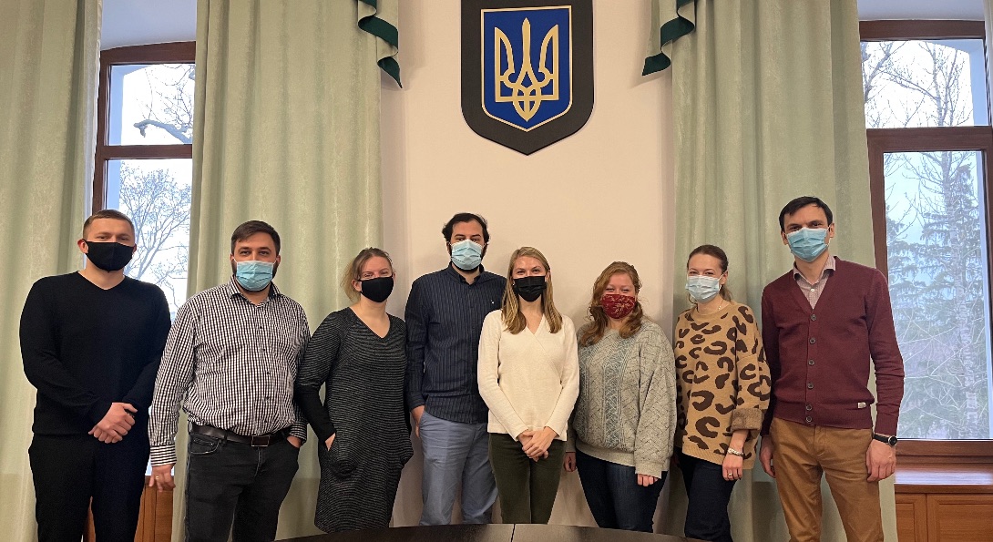 Tamara Kozyckyj poses for a photo with members of the Ukrainian Ministry of Health