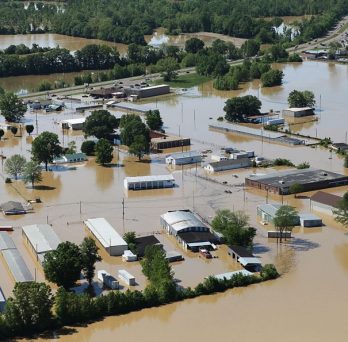A rural Illinois community is submerged in water in a large flood.
                  