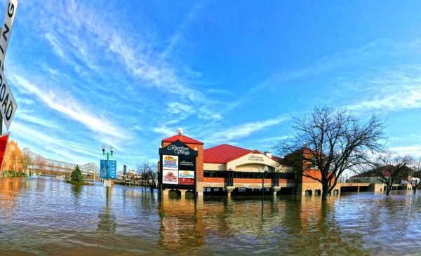 Floodwaters cover a shopping center in Peoria, Illinois.