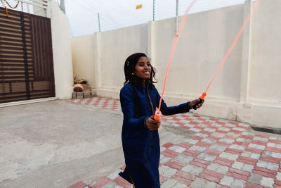 Young girl jumping rope at Chaithanya Mahila Mandali