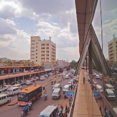 A busy street with traffic in Kampala, Uganda.