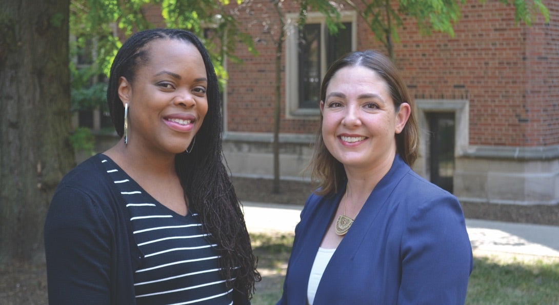 Uchechi Mitchell and Melissa Gutierrez-Kapheim pose for a photo.