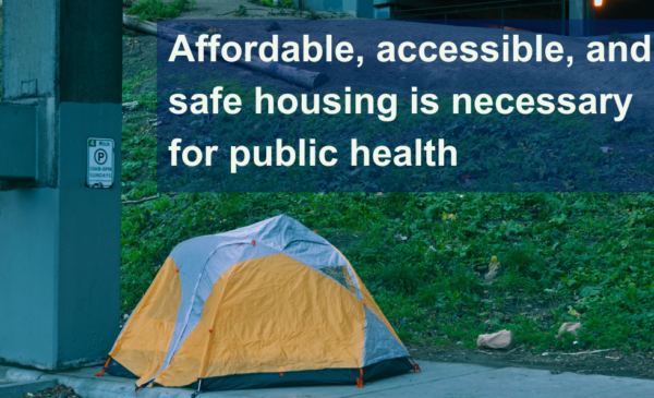 Tent on a sidewalk with text above that says affordable, accessible, and safe housing is necessary for public health